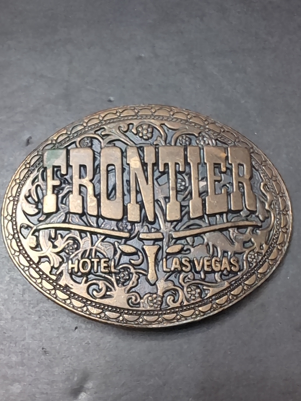 VGT, Frontier Hotel Las Vegas Oval Brass/Bronze Belt Buckle.